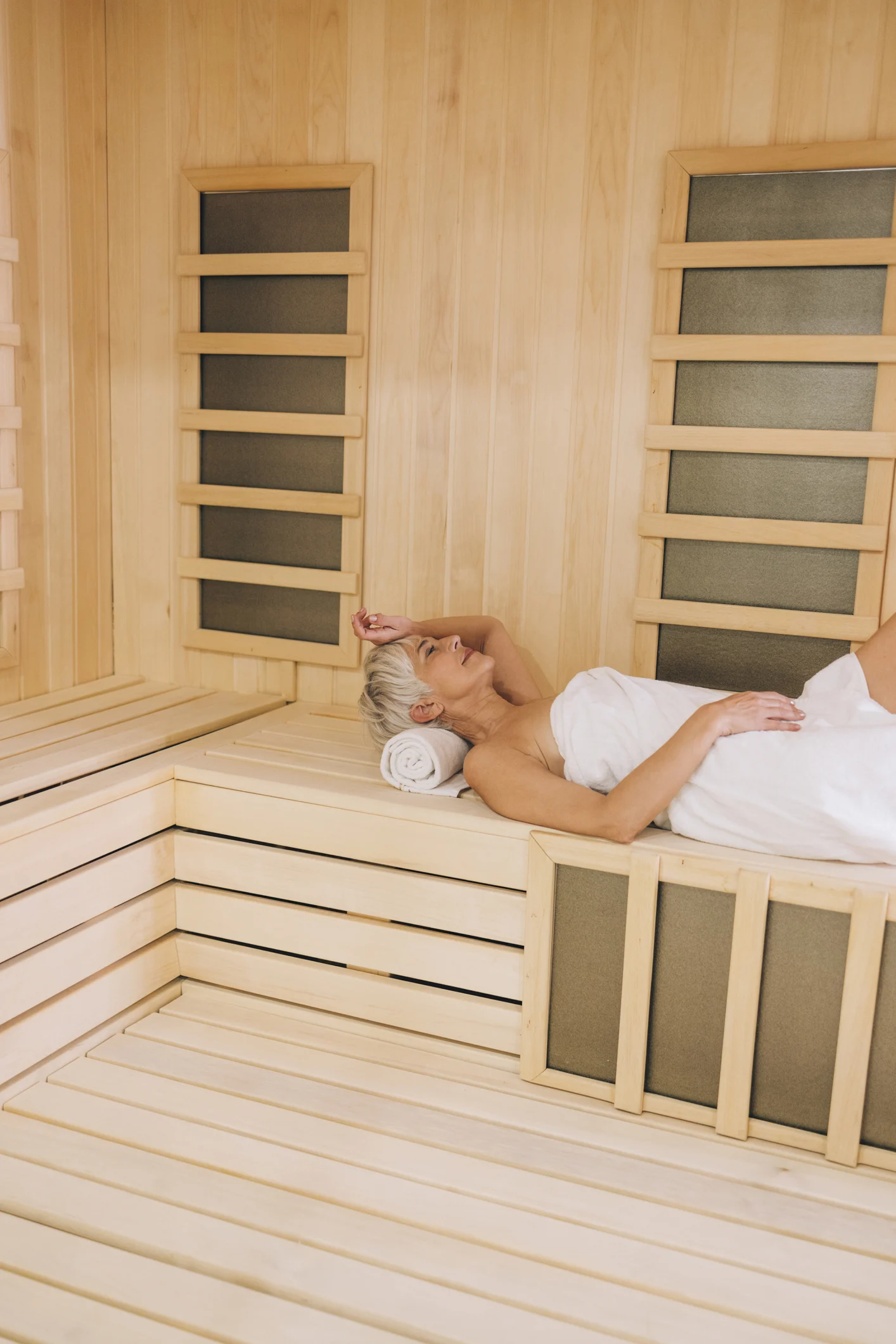 Beautiful senior woman in sauna